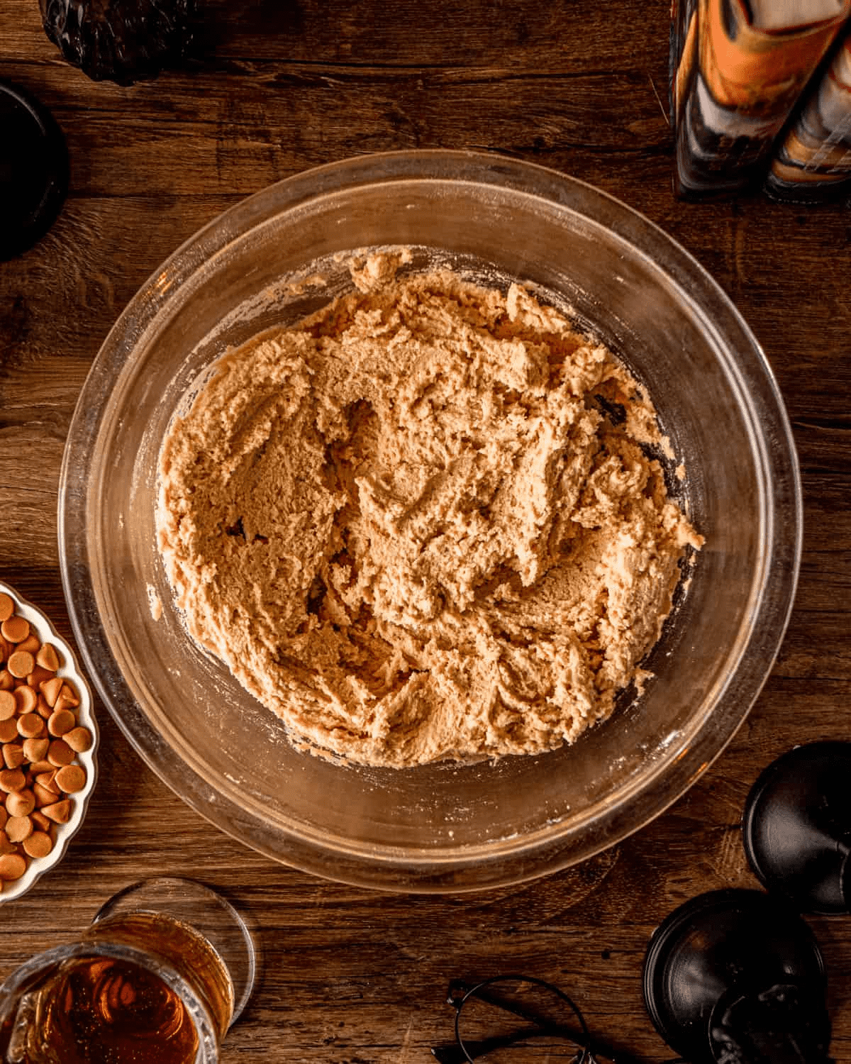 The dough after the flour has been mixed in — smooth, uniform tan, no streaks of dry flour visible.