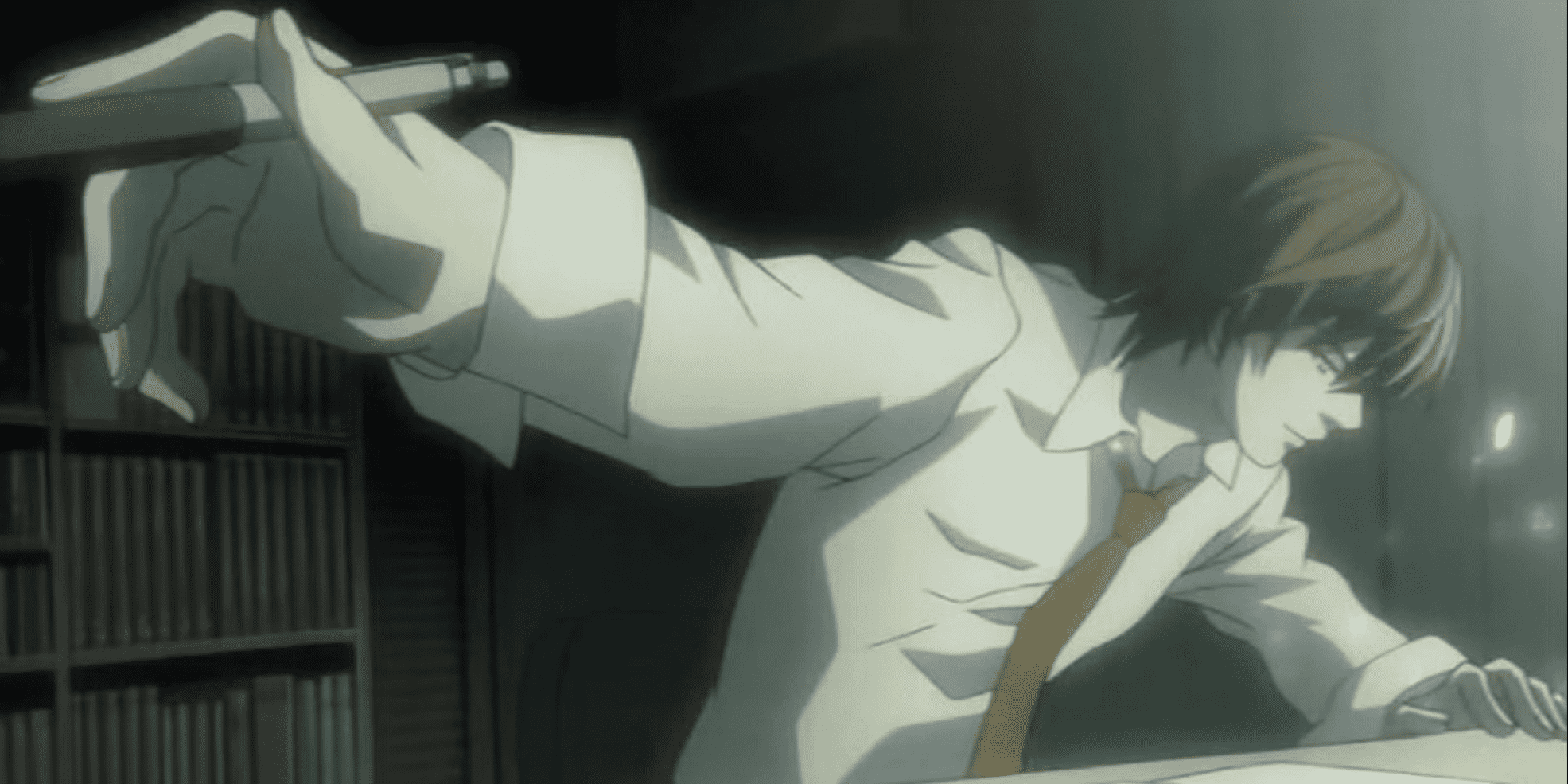 Light Yagami writing in the Death Note